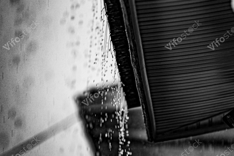 Raindrop falling from a rooftop in Kigali during a heavy downpour , 2, 0D8A0537